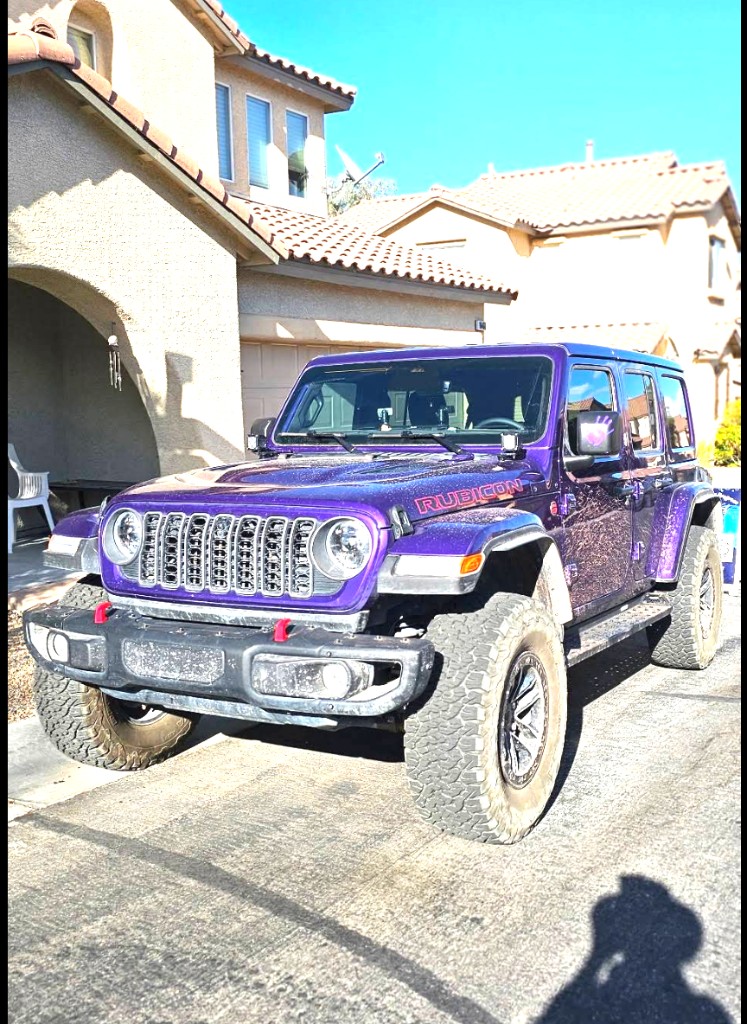 Dusty purple Jeep Rubicon before exterior detailing